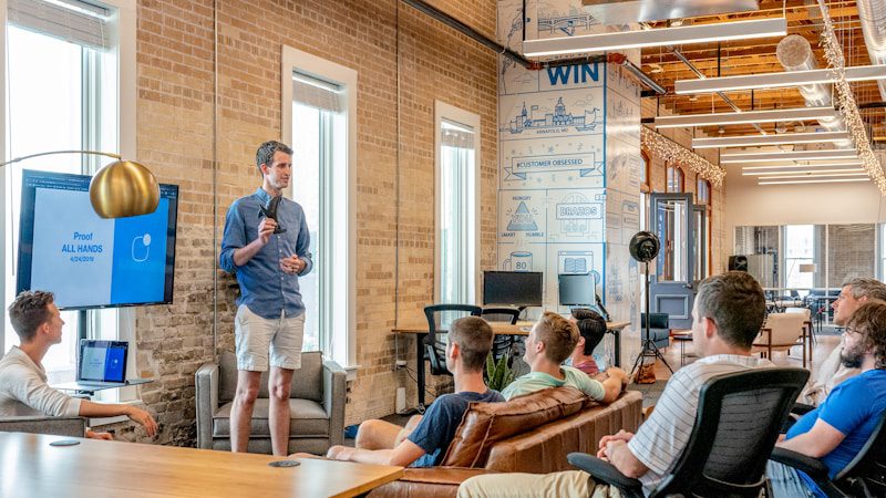 Small business team meeting in a bright loft office